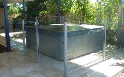 outdoor spa pool with glass fence